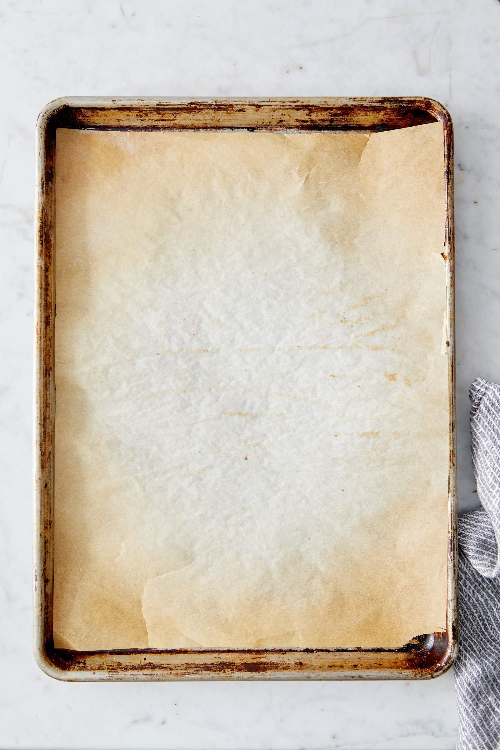 King Arthur Professional-Grade Pre Cut Parchment Paper Sheets for Baking: 100 Count, Nonstick, Reusable, Heavy-Duty, Fits 18 x 13 in Pan, Silicone-Coated, USA-Made Baking Supplies - Image 4
