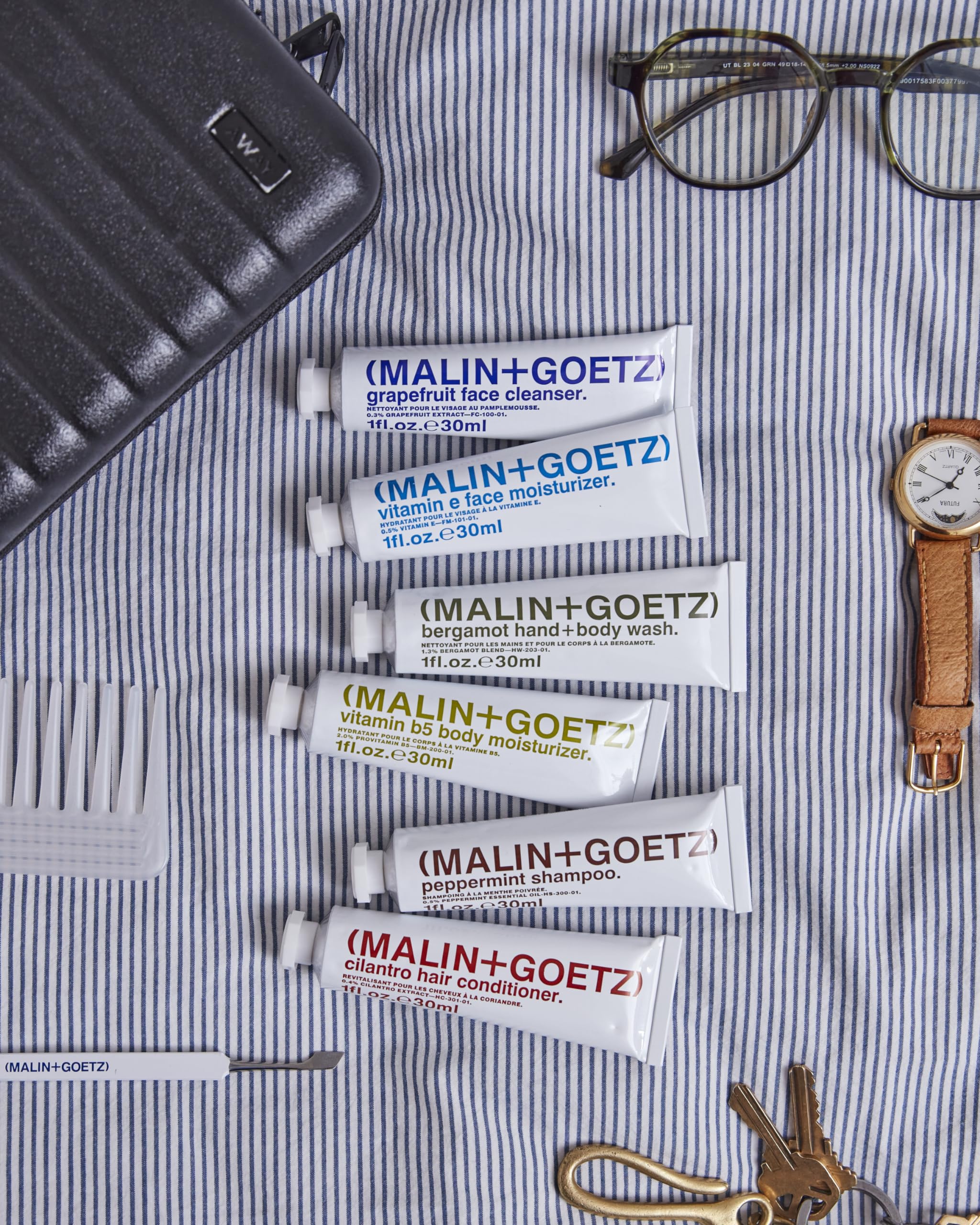 MALIN+GOETZ Best-Sellers Travel Kit | Six Everyday Essentials for Face, Body + Hair | Grapefruit Face Cleanser, Vitamin E Face Moisturizer, Peppermint Shampoo + More | Vegan, Travel-Friendly(6 x 1 oz) - Image 3